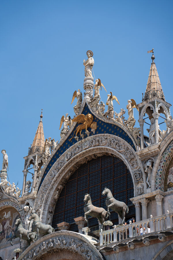 The facade of St Mark's Basilica in Venice with its bronze horses